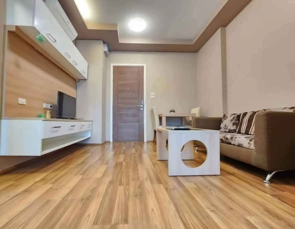 living room and bedroom of The Treasure Condominium by My Hip