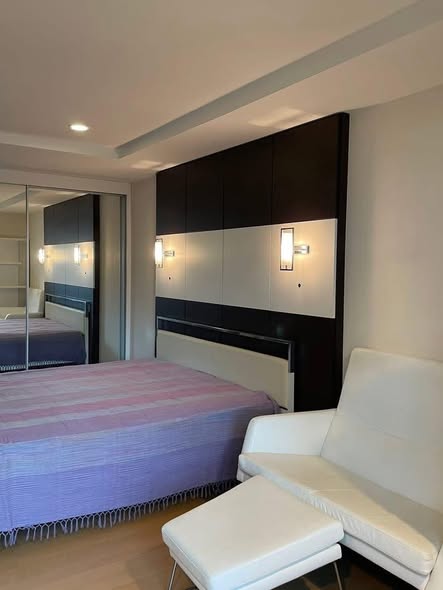 bedroom of The Trendy Condominium