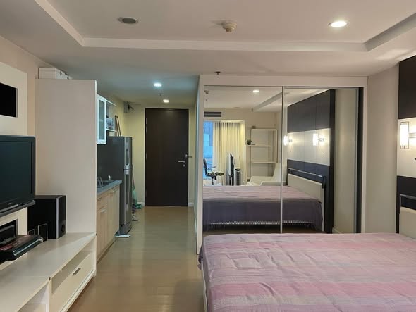 bedroom of The Trendy Condominium