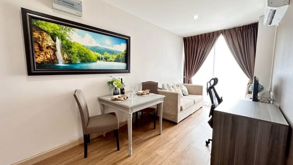 bedroom and living room of The Unique Lat Phrao 26