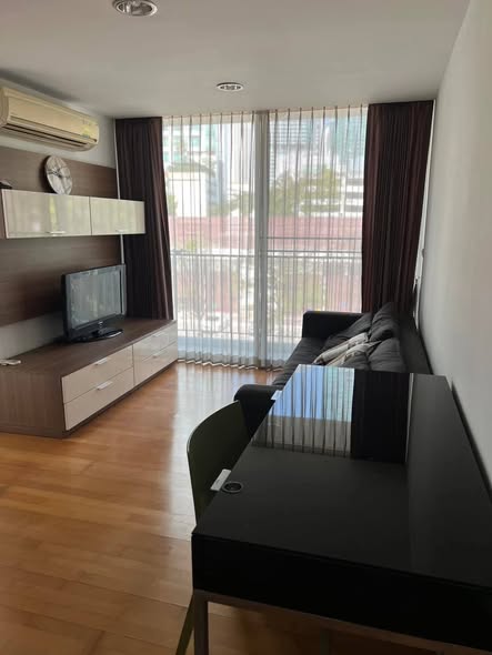 bedroom and living room of TheFine@River