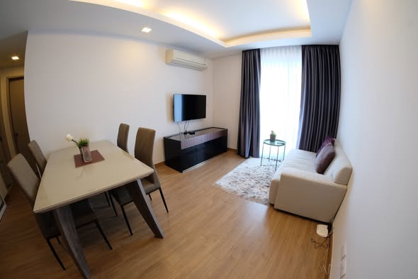 bedroom and living room of Thru Thong Lor