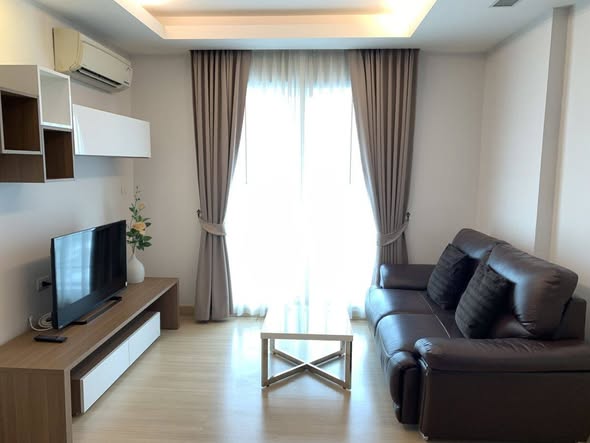 bedroom and living room of Thru Thong Lor