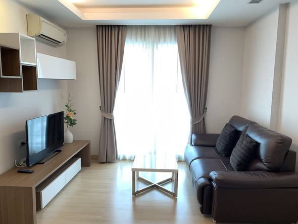 bedroom and living room of Thru Thong Lor