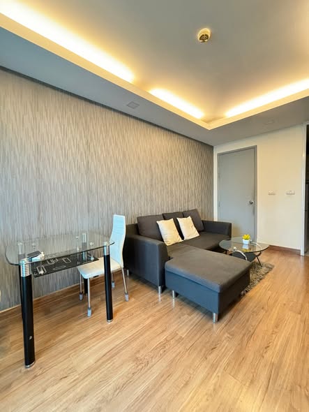 bedroom and living room of Thru Thong Lor