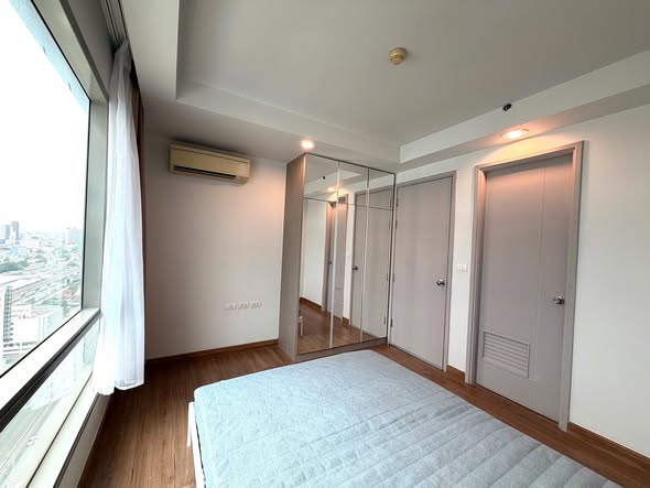 bedroom and room interior of Thru Thong Lor