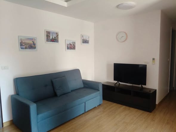 living room and bedroom of Thru Thong Lor