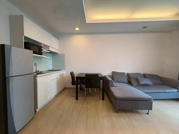 living room and bedroom of Thru Thong Lor