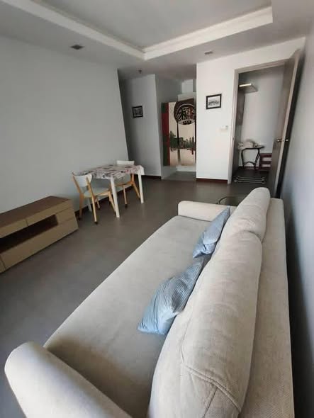 living room and bedroom of Thru Thong Lor