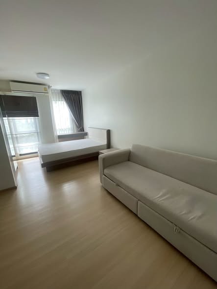 living room and bedroom of UNiO Sukhumvit 72