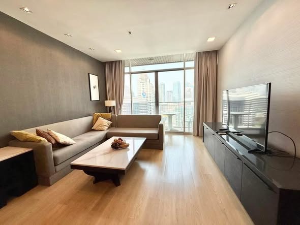 living room and bedroom of Urbana Sathorn