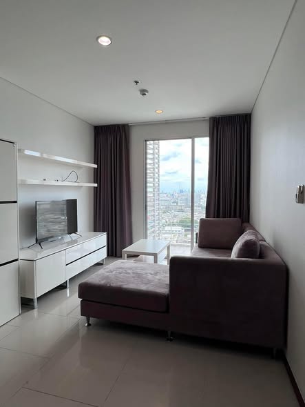 bedroom and living room of Villa Sathon Condominium