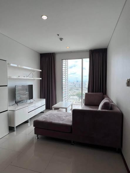 bedroom and living room of Villa Sathon Condominium