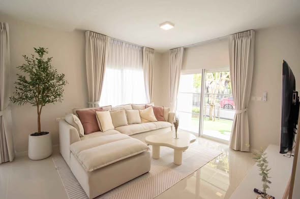 living room and bedroom of Villaggio 3 Srinakarin-Bangna