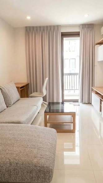 living room and bedroom of Vista Garden Condo