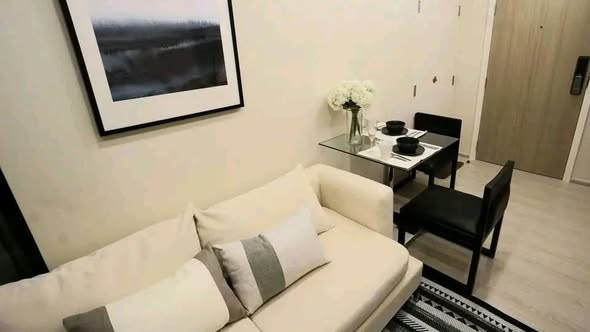 bedroom and living room of VTARA36 Condominium