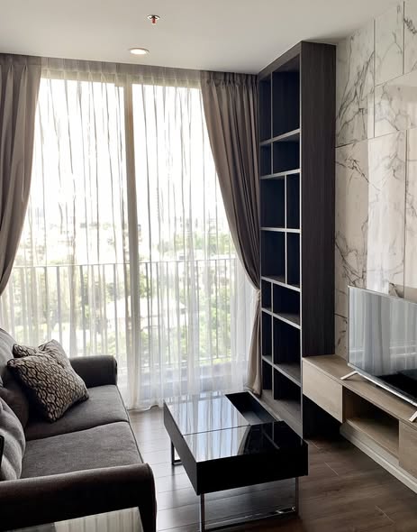 living room and room interior of Whizdom Essence Sukhumvit วิสซ์ดอม เอสเซ้นส์ สุขุมวิท