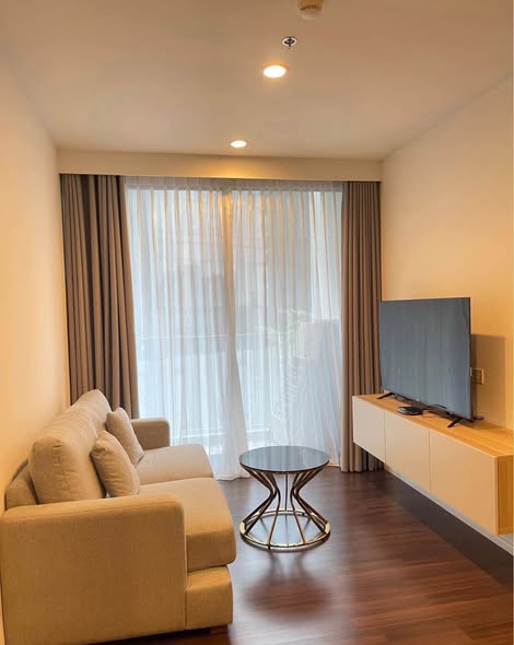 living room and bathroom of Whizdom Inspire Sukhumvit วิสซ์ดอม อินสปาย สุขุมวิท