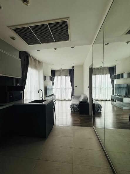 living room and bedroom of WYNE by Sansiri