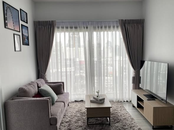 living room and bedroom of XT Ekkamai