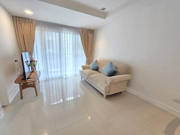 living room and bedroom of agent post