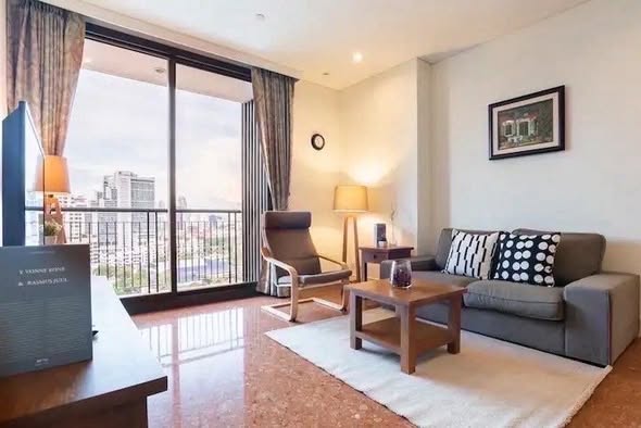 living room and bedroom of Aguston Sukhumvit 22
