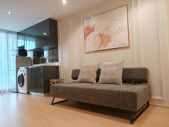 bedroom and living room of Altitude Sam Yan – Si Lom