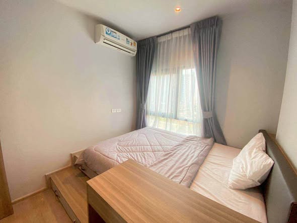 bedroom of Altitude Unicorn Sathorn