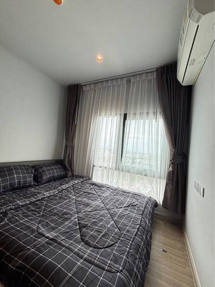 bedroom of Altitude Unicorn Sathorn