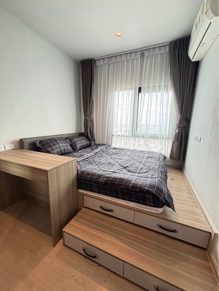 bedroom of Altitude Unicorn Sathorn