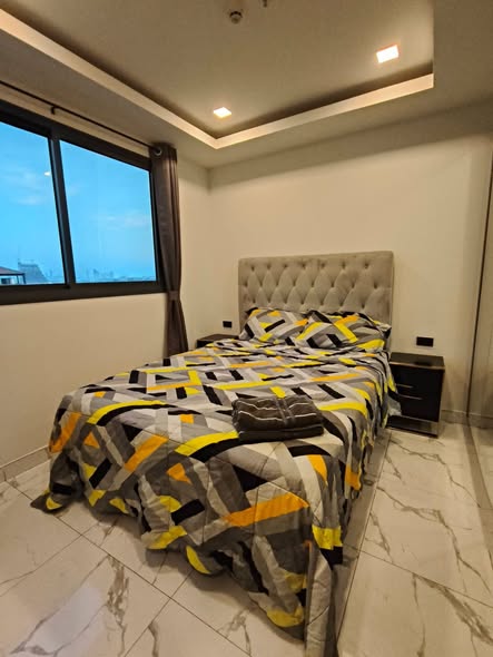 bedroom of Arcadia Millennium Tower