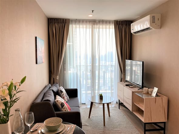 bedroom and living room of Artemis Sukhumvit 77