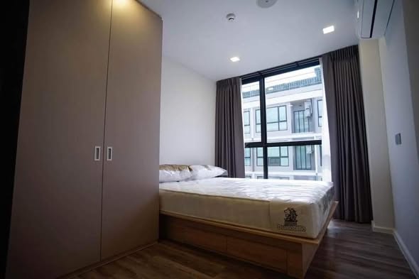 bedroom of Atmoz รัชดา-ห้วยขวาง คอนโด