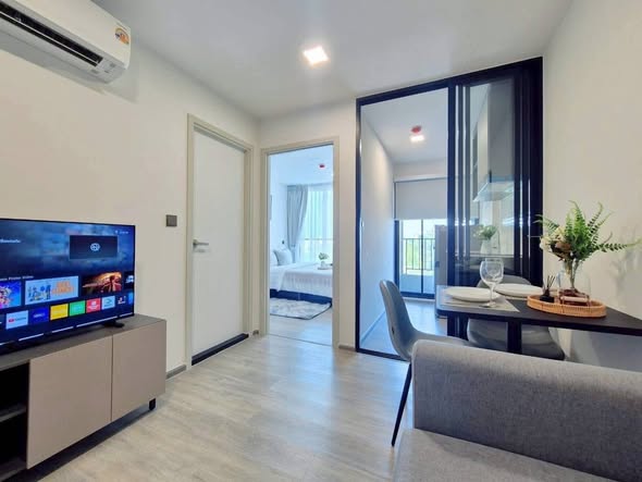 living room and room interior of Atmoz Palacio Ladprao Wanghin | แอทโมซ พาลาซิโอ ลาดพร้าว วังหิน