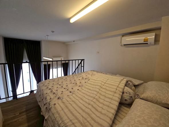 bedroom of Blossom Condo at Fashion Altitude