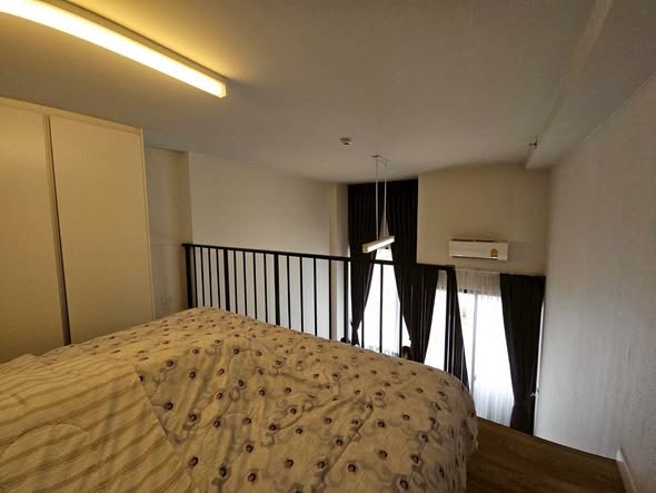 bedroom of Blossom Condo at Fashion Altitude