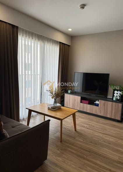bedroom and living room of Blossom Condo Sathon-Charoen Rat