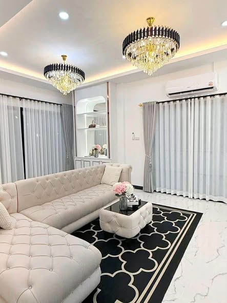 bedroom and living room of B.U. House Two