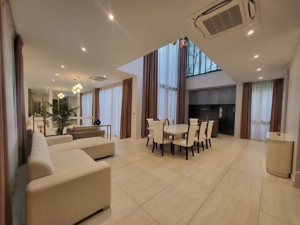 bedroom and living room of บูก้าน กรุงเทพกรีฑา | Bugaan Krungthep Kreetha