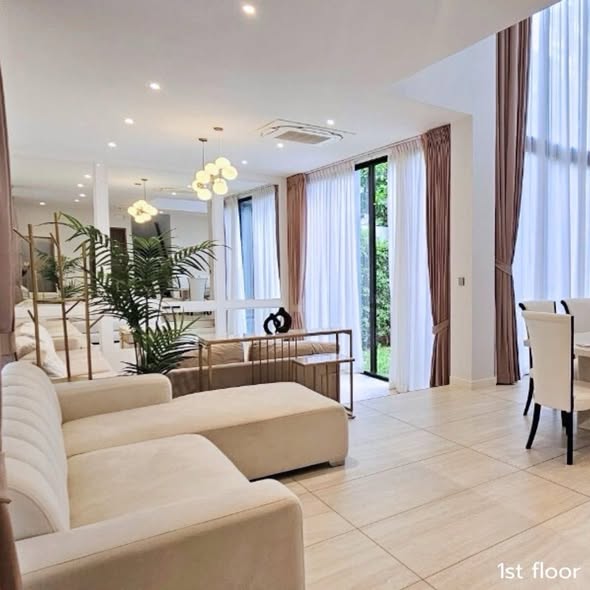living room and bedroom of บูก้าน กรุงเทพกรีฑา | Bugaan Krungthep Kreetha