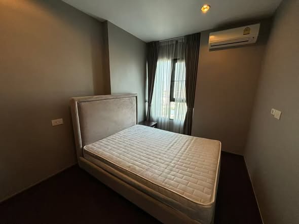 bedroom of C Ekkamai Condominium