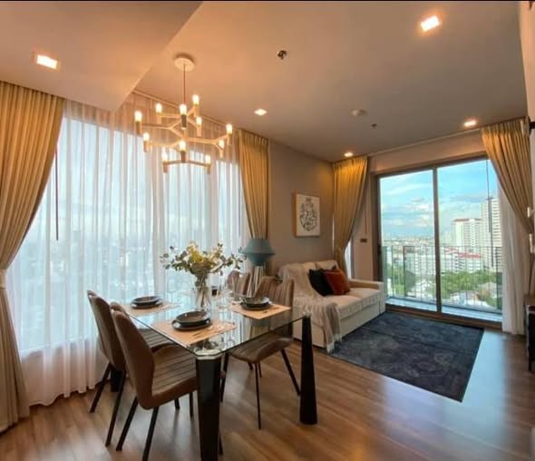 bedroom and living room of CEIL By Sansiri