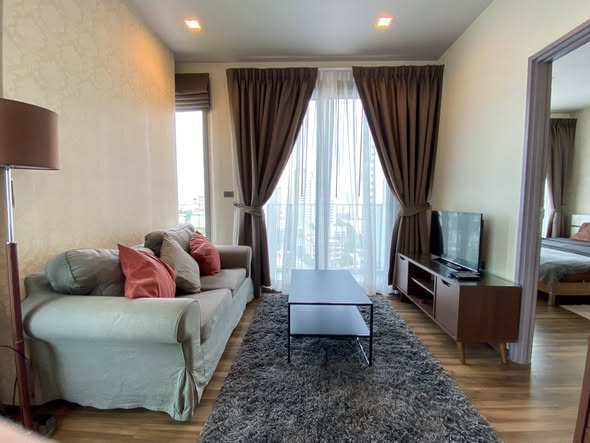 living room and bedroom of CEIL By Sansiri