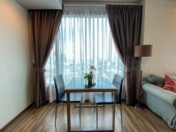 living room and bedroom of CEIL By Sansiri