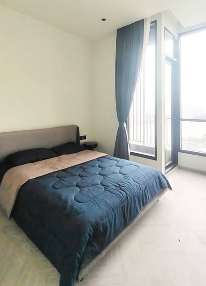 bedroom of Chapter Charoennakhon–Riverside
