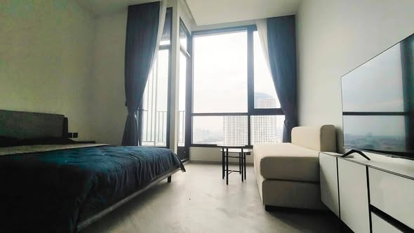 bedroom and living room of Chapter Charoennakhon–Riverside