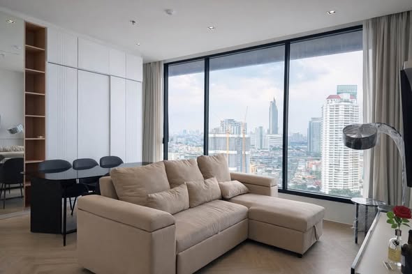 bedroom and living room of Chapter Charoennakhon–Riverside