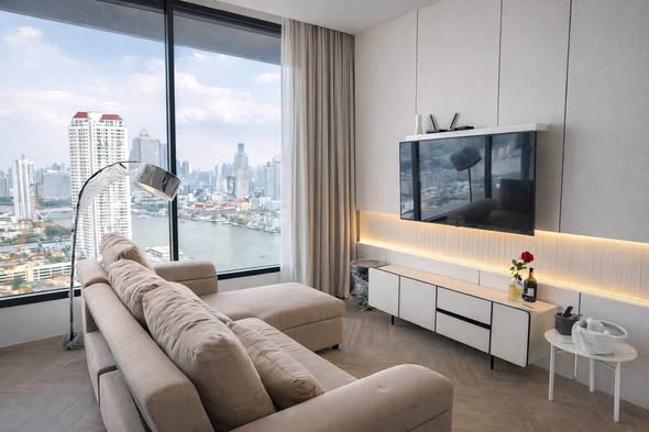 bedroom and living room of Chapter Charoennakhon–Riverside