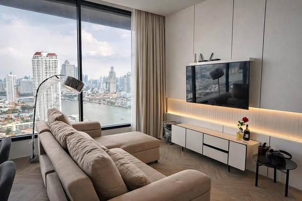 bedroom and living room of Chapter Charoennakhon–Riverside
