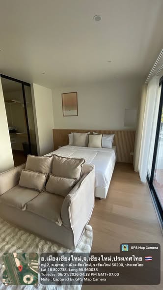 living room and bedroom of Chomdoi Condotel—2